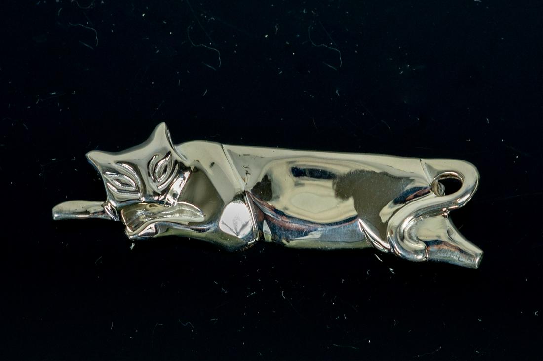 TIFFANY & CO ART DECO STERLING SILVER CAT BROOCH: Tiffany & Company sterling silver brooch in the form of a cat. Marked to underside. Measures 2 1/2" length.