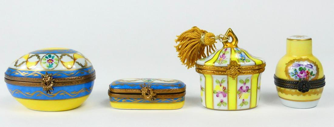 4pc LIMOGES FLORAL PORCELAIN TRINKET BOXES: Four Limoges porcelain trinket or pill boxes with floral decoration. Includes egg, vase, oblong and basket-form with tassel. Each marked to underside. Egg measures 2 3/8" length.