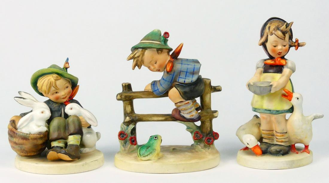 3pc HUMMEL PORCELAIN FIGURINES TMK-2: Three Hummel porcelain figures including Retreat to Safety, Playmates and Be Patient. Each holds TMK-2 mark to underside. Largest measures 6 1/4" height. keywords: frog, goose, geese, Easter, rabbit, 