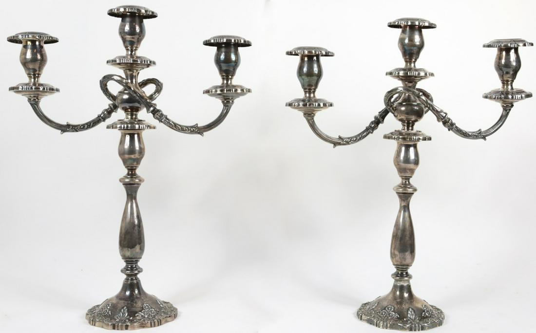 PR FISHER ENGLISH ROSE STERLING SILVER CANDELABRA: Pair of Fisher sterling silver 3-light candelabra in the English Rose pattern. Each marked Fisher, Sterling Weighted, 2450, "English Rose" and hold remnants of original label. Each measures 18" height