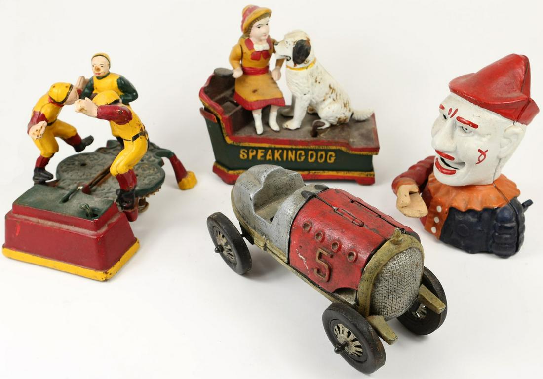 5pc CAST IRON MECHANICAL BANKS & CAR: Group of five reproduction cast iron toys. Include four mechanical banks: Speaking Dog, Clown, Rugby/Football, Dentist. Also includes large car #5-10". Each bank measures approx 7-8".