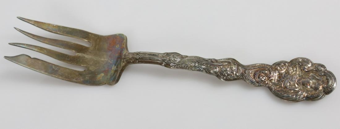 GORHAM VERSAILLES STERLING SILVER SERVING FORK: Gorham sterling silver cold meat serving fork in the Versailles pattern. Hallmarked and marked sterling to underside. Measures 8 1/4" length. Total weight 3.2ozt.