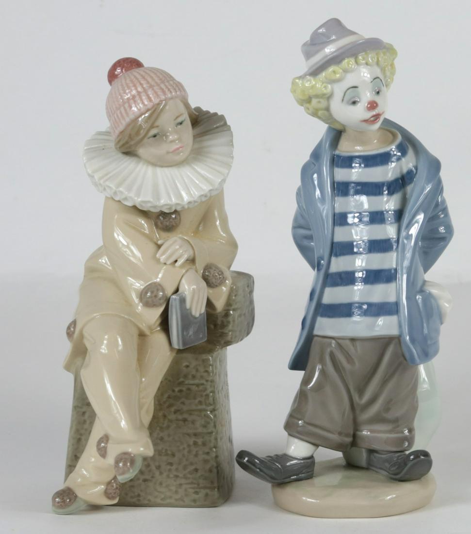 2pc LLADRO PORCELAIN CLOWN FIGURINES: Two Lladro porcelain figures including 'Little Jester' #5203 and 'Little Traveler' #7602. Each marked to underside. Measures 8 1/4" and 8 3/4" height respectively.