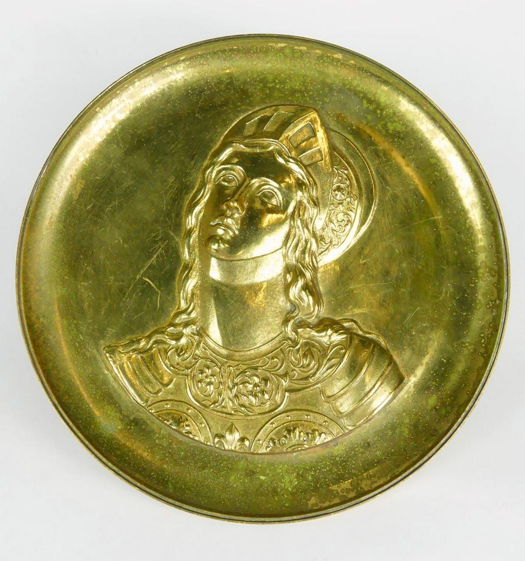 ANTIQUE BRASS REPOUSSE TAZZA: Antique European brass tazza or compote decorated with repousse bust. Measures 13 1/4" diameter x 4 7/8" height.