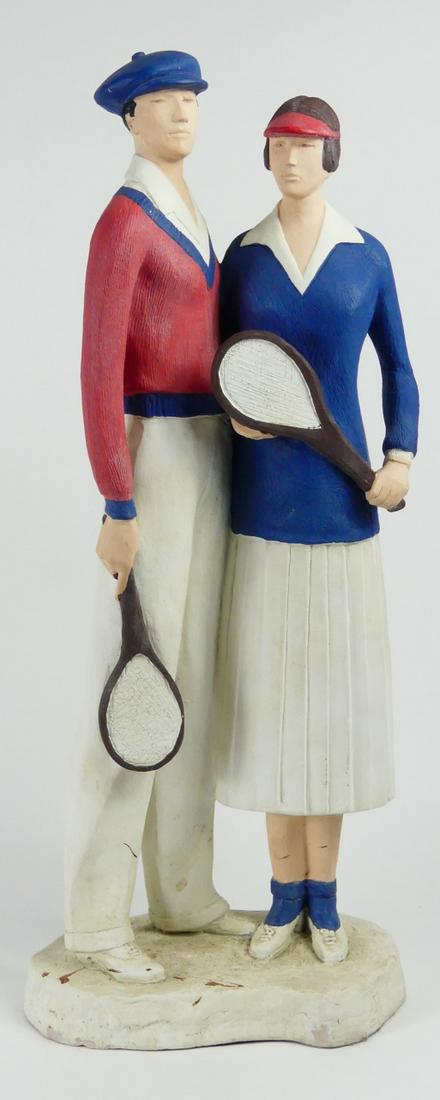 CLAUDE LeCLERC AUSTIN POLYCHROMED TENNIS PLAYERS: Claude Le Clerc for Austin polychromed sculpture depicting tennis players. Signed LeClerc, marked Austin Prod Inc and dated 1988 to base. Measures 21" height.