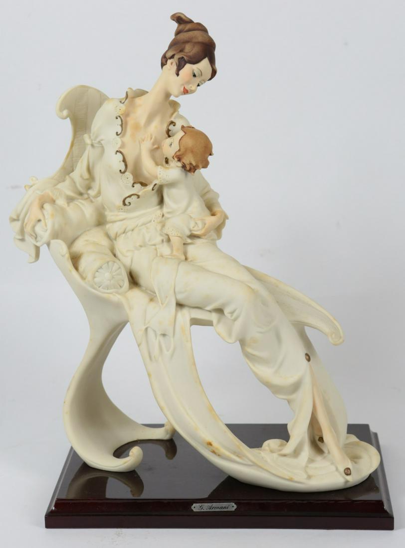 GIUSEPPE ARMANI 'MOTHER & CHILD' FIGURINE: Giuseppe Armani 'Mother and Child' figure #405F. Marked and signed to back of figure. Measures 14 1/2" height x 12" length.