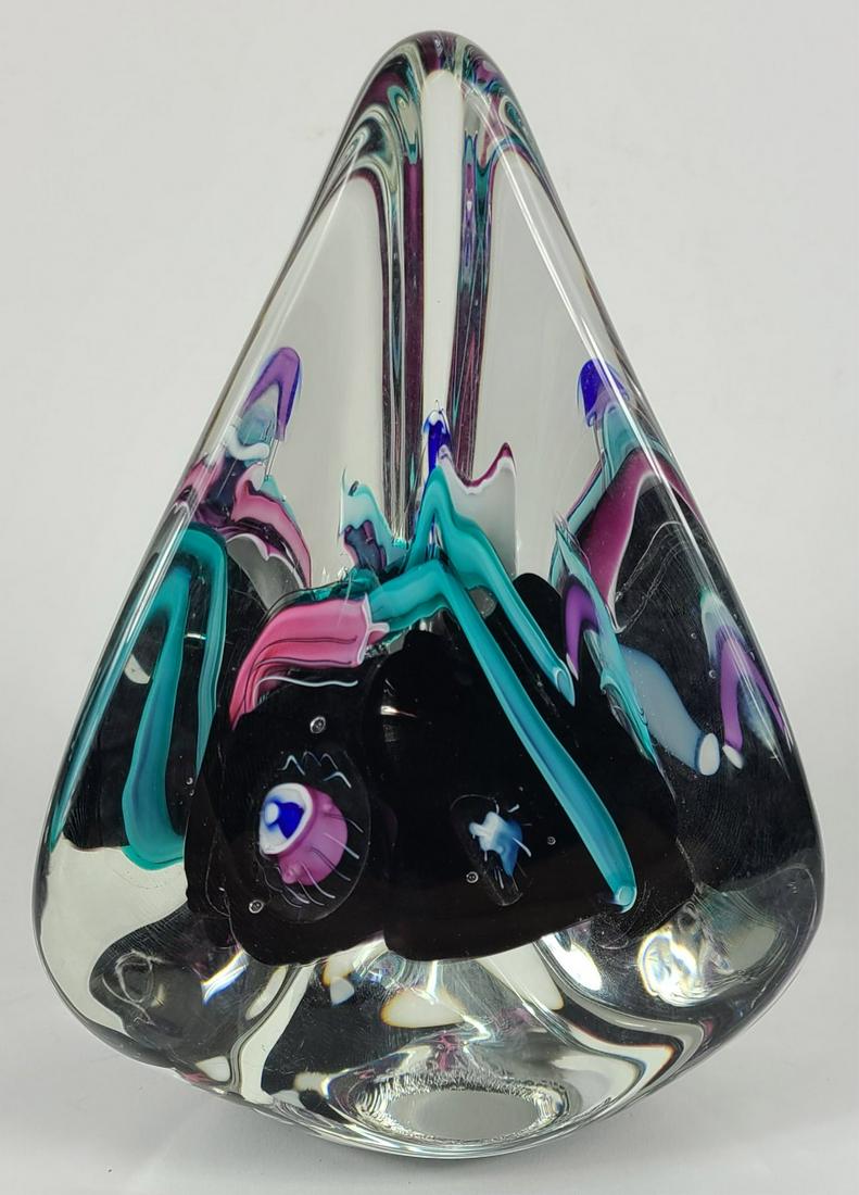 SCHMIDT RHEA STUDIO GLASS OVERSIZED PAPERWEIGHT: Large studio art glass paperweight of triangular form with abstract decoration. Signed to underside and dated 1992. Measures 7 1/2" height.