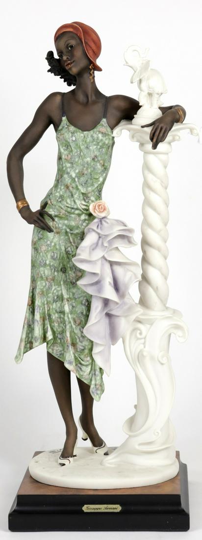 GIUSEPPE ARMANI MAHOGANY SCULPTURE w BOX: Giuseppe Armani Mahogany figurine #194C. Numbered 3667/5000. Figure measures 16 3/4" height. Includes original box.