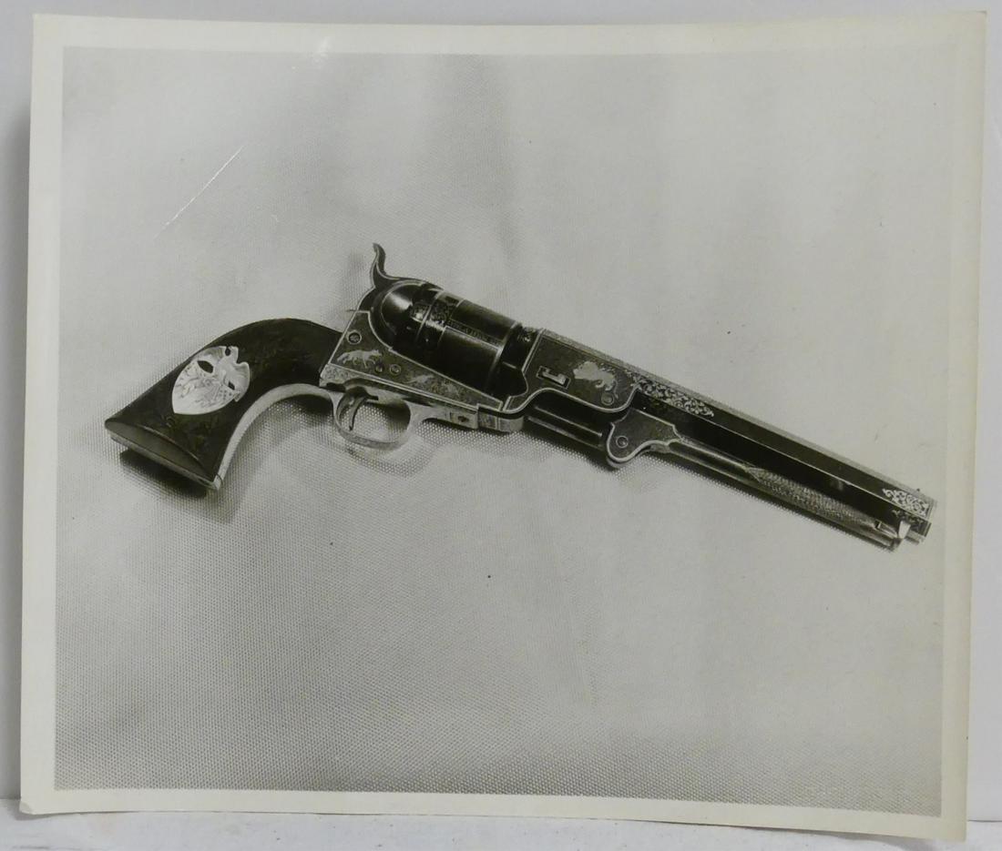 ANDY WARHOL REVOLVER PHOTOGRAPH: Andy Warhol photo print on albumen paper depicting a revolver / gun. Holds blindstamp and Warhol Estate authentication stamp. Measures 10" x 8".