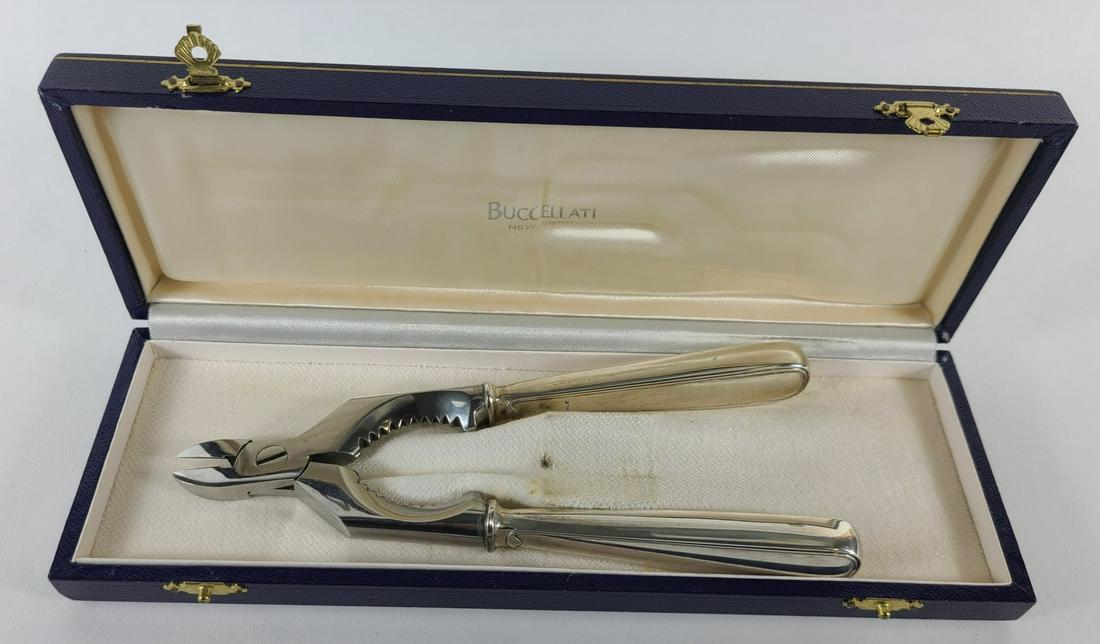 BUCCELLATI 'OLD ITALIAN' STERLING CHAMPAGNE OPENER: Buccellati sterling silver Champagne Opener in the Old Italian pattern. Each handled marked Italy, 925. Measures 6 7/8" length. Includes fitted Buccellati box-9 1/4" length.