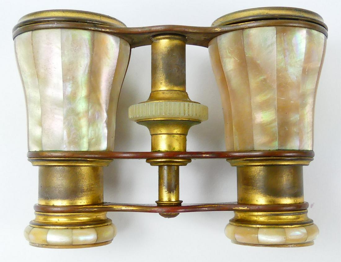 LEMAIRE FRENCH MOTHER OF PEARL OPERA GLASSES: Lemaire French brass and mother of pearl opera glasses. Measures 3 3/4" x 2 5/8".