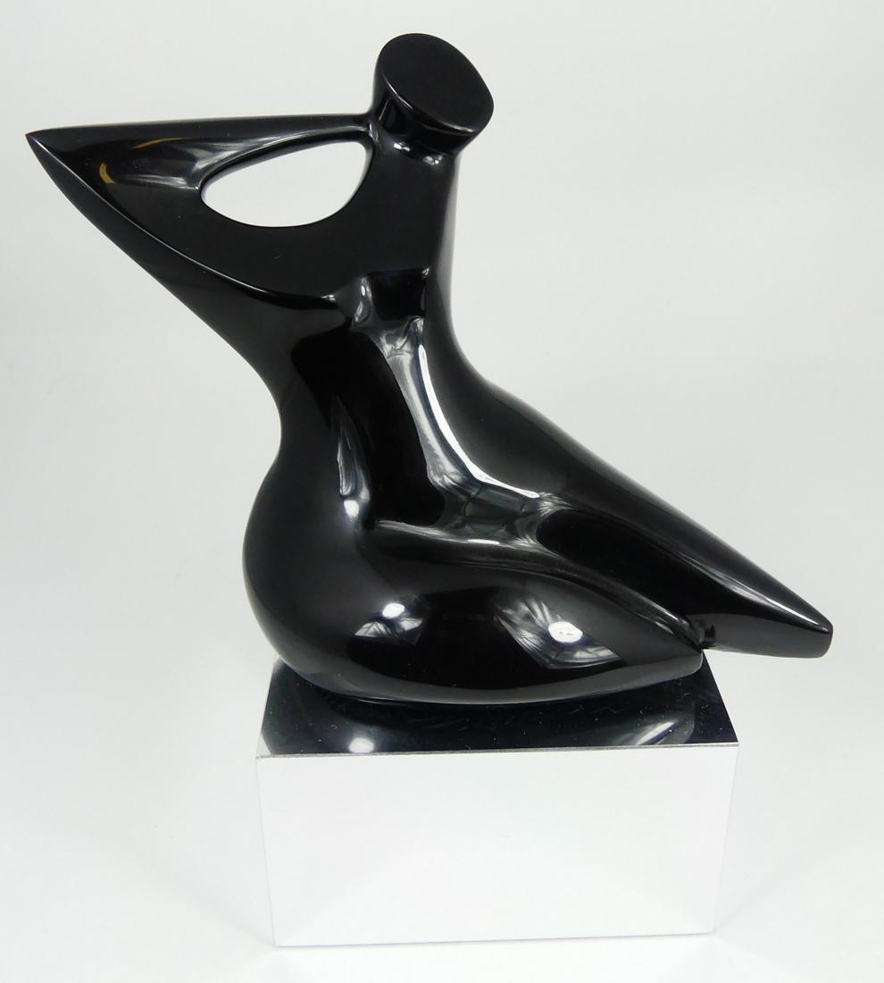 LUCILLE FRIEDLAND ABSTRACT FIGURAL SCULPTURE: Lucille Friedland (American) abstract sculpture depicting a reclining nude female on chrome base. Unsigned. Measures 10" height. Provenance: Acquired directly from the artist.