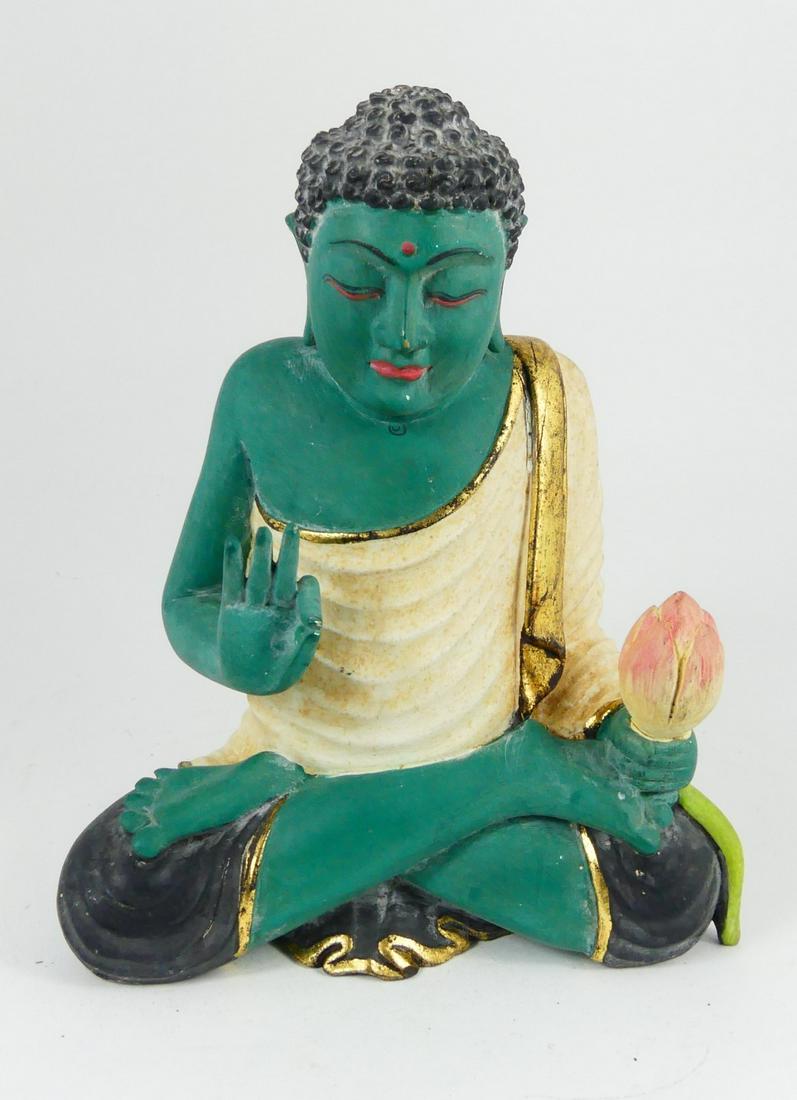 CARVED & POLYCHROMED WOODEN BUDDHA: Carved and polychromed seated Buddha figure. Measures 9 1/4" height.