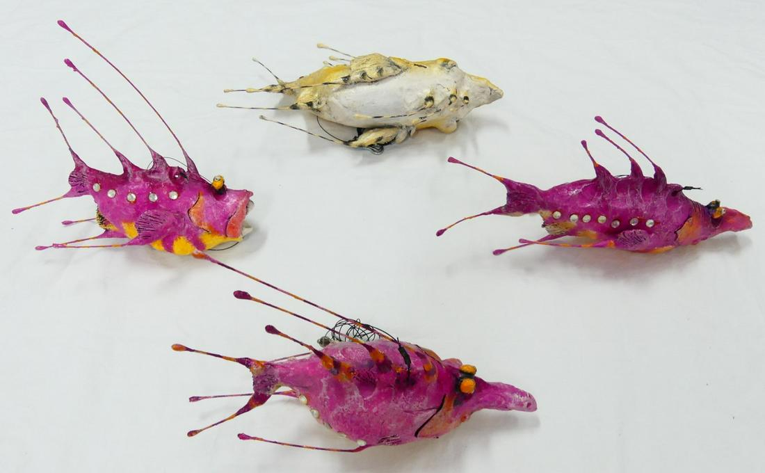 4pc TODD WARNER PINK AND YELLOW FISH SCULPTURE: Todd J. Warner (American, b. 1945) painted clay and wire fish with jeweled embellishments. Three fish painted pink and one painted yellow. The largest measures approximately 13" in length 10" in heigh