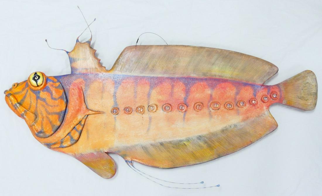 TODD WARNER PURPLE STRIPED FISH SCULPTURE: Todd J. Warner (American, b. 1945) painted wood, clay, metal and glass red fish. Measuring approximately 47" in length and 27" in height. Signed and dated 1990 in pencil lower right.