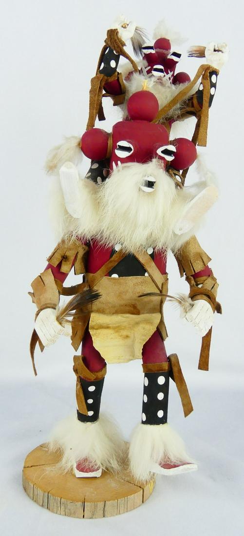 L. JOE MUDHEAD KACHINA DOLL: Hopi Native American carved wood Kachina doll. Signed L Joe (?) and titled Mudhead to underside. Measures 13 1/2" height.