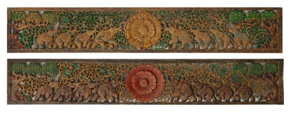 PR ASIAN CARVED PAINTED WOOD ELEPHANT WALL PANELS: Pair of carved and painted reticulated wood wall panels depicting elephants, trees and flowers. Probably Thai. Each measures 82 1/2" x 13 1/2".