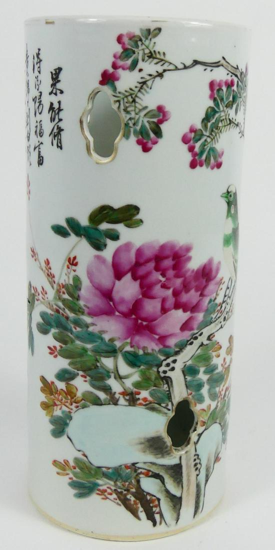 CHINESE FAMILLE ROSE PORCELAIN HAT STAND: Chinese Famille Rose porcelain hat stand depicting birds perched on floral branches. Marked to underside and holds remnants of wax seal. Measures 11" height.