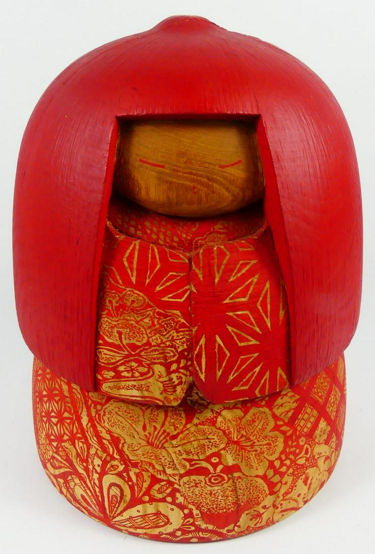 2pc ISHIHARA HIDEO JAPANESE CARVED WOOD KOKESHI: 2 Japanese carved wooden Kokeshi dolls by Ishihara Hideo. Heavy large stout female in red with gold decoration, signed to underside-14" x 10 1/2". Slim, tall torso painted in dark brown with attached 