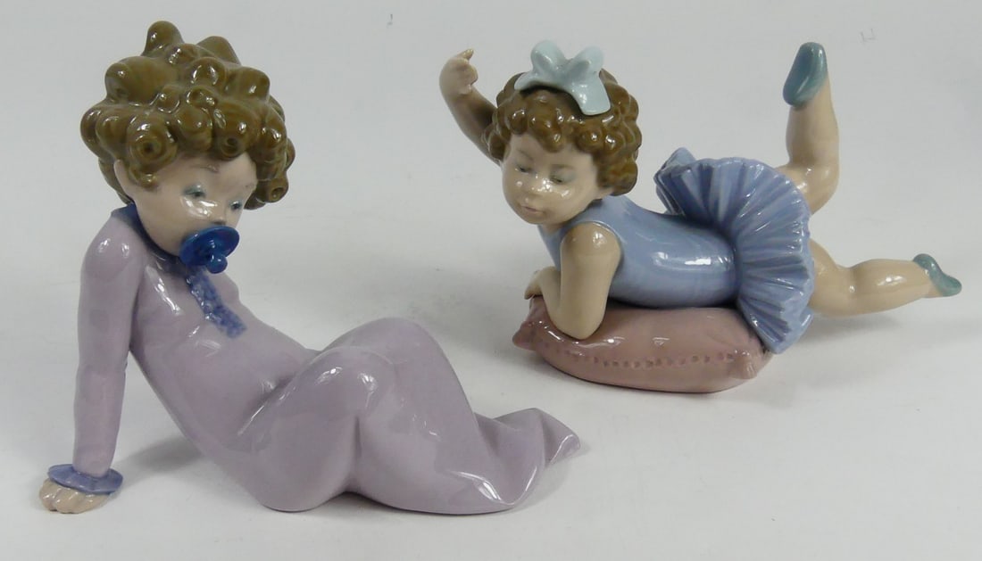 2pc LLADRO PORCELAIN CHILDREN FIGURINES: Two Lladro porcelain figures depicting children. Largest measures 7" length.