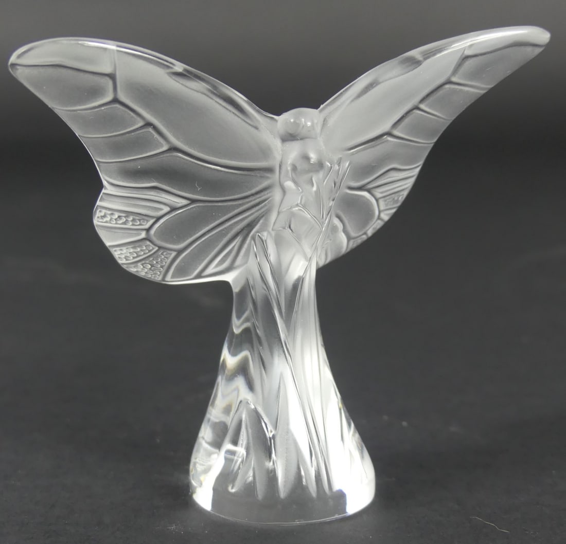 LALIQUE FROSTED CRYSTAL BUTTERFLY PAPERWEIGHT: Lalique French frosted crystal butterfly / papillon paperweight. Signed to underside. Measures 3 1/2" width x 3 1/4" height.