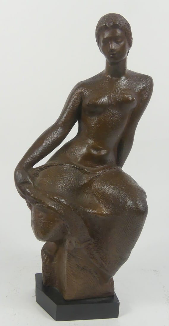 VINCENT GLINSKY BRONZED SEATED NUDE SCULPTURE: Vincent Glinsky (Russian 1895-1975) bronzed sculpture depicting a seated nude woman. Signed to side of base. Measures 14 1/4" x 5" x 6".