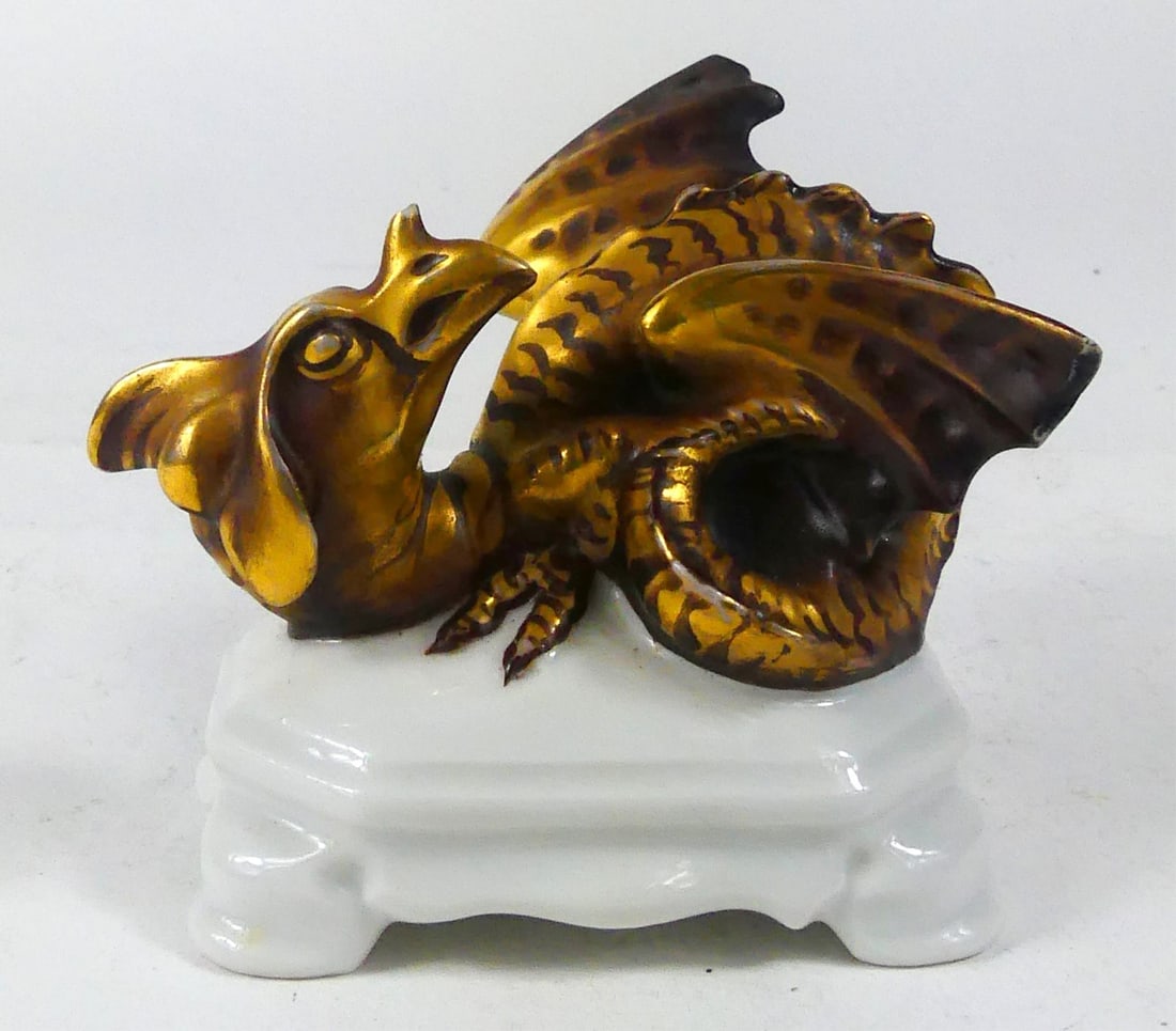 ROSENTHAL PORCELAIN DRAGON FIGURE: Rosenthal porcelain dragon figurine. Marked to underside. Measures 2 3/4" l x 2 5/8" h x 2 1/4" w. note: chipped wings.