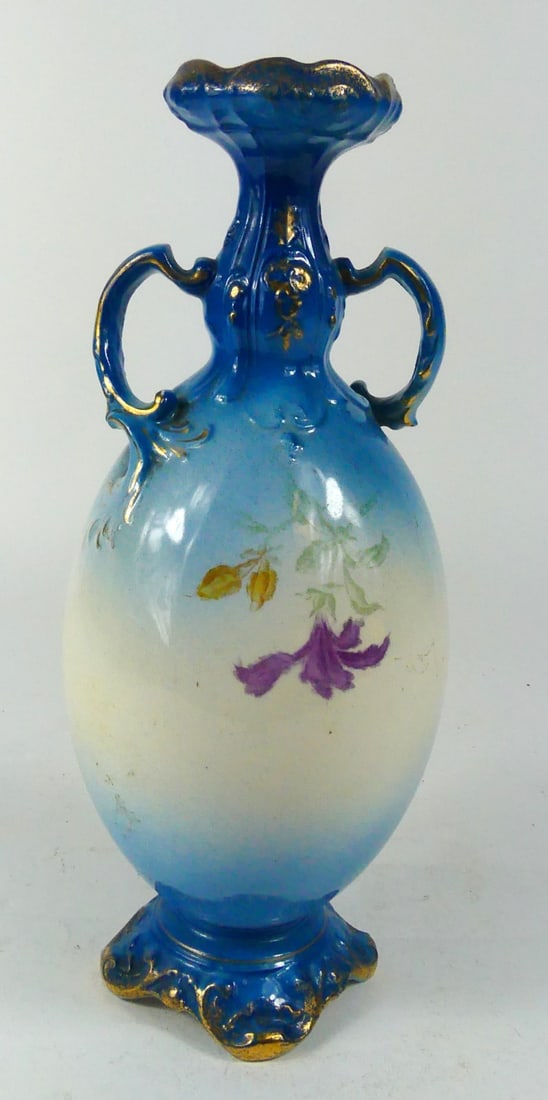 ROYAL BONN HANDLED PORCELAIN FLORAL VASE: Royal Bonn handled porcelain vase with floral decoration. Marked to underside. Measures 10 1/4" x 4" x 4".