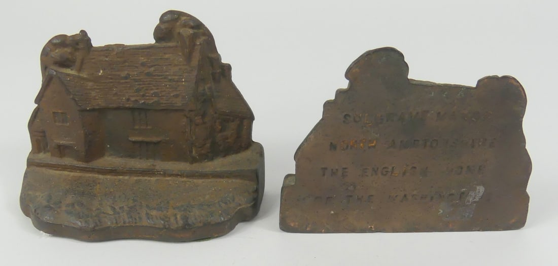 PR SULGRAVE MANOR CAST IRON BOOKENDS: Pair of cast iron sulgrave manor bookends. Each with story to verso. Measures 5 1/8" l x 4" h.