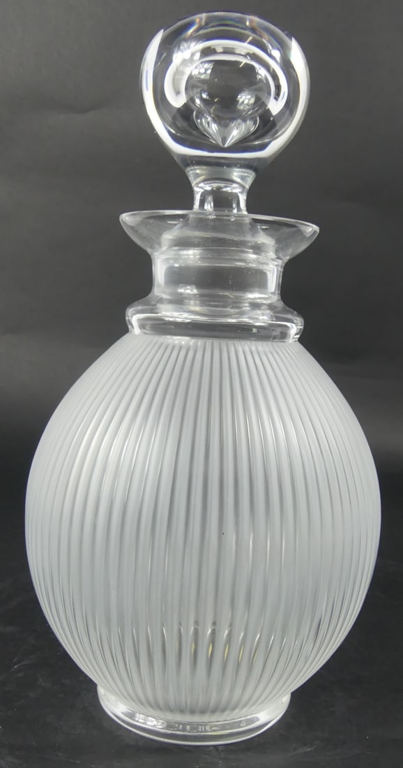 LALIQUE 'LANGEAIS' FROSTED CRYSTAL DECANTER: Lalique 'Langeais' frosted crystal decanter having a ribbed body. Colorless stopper. Marked to underside. Measures 10" height.