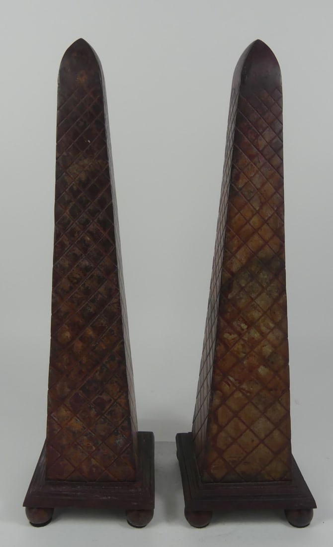 PR VINTAGE PATINATED METAL OBELISKS: Pair of vintage patinated metal obelisk sculptures. Each measures 17" height.