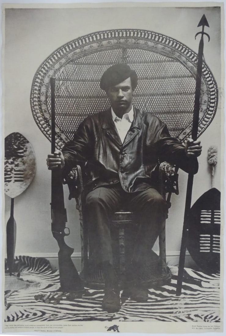 HUEY NEWTON BLACK PANTHER PARTY POSTER: Black Panther Party for Self Defence poster depicting Huey P. Newton seated with rifle and spear. Sheet measures 35" x 22 3/4". Print date unknown.