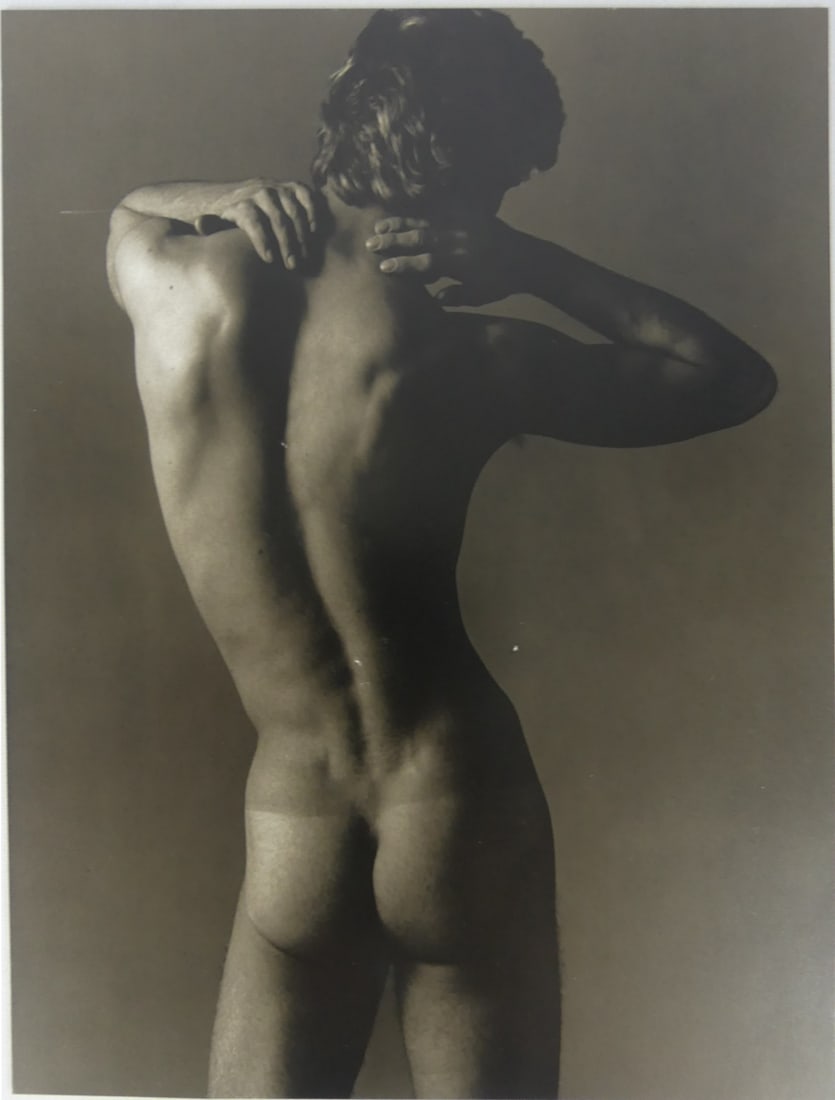 KEN HAAK 'NUDE MALE' PHOTO-LITHO: Ken Haak photo lithograph depicting a nude male figure. Mounted. Measures 12 3/4" x 9 7/8".
