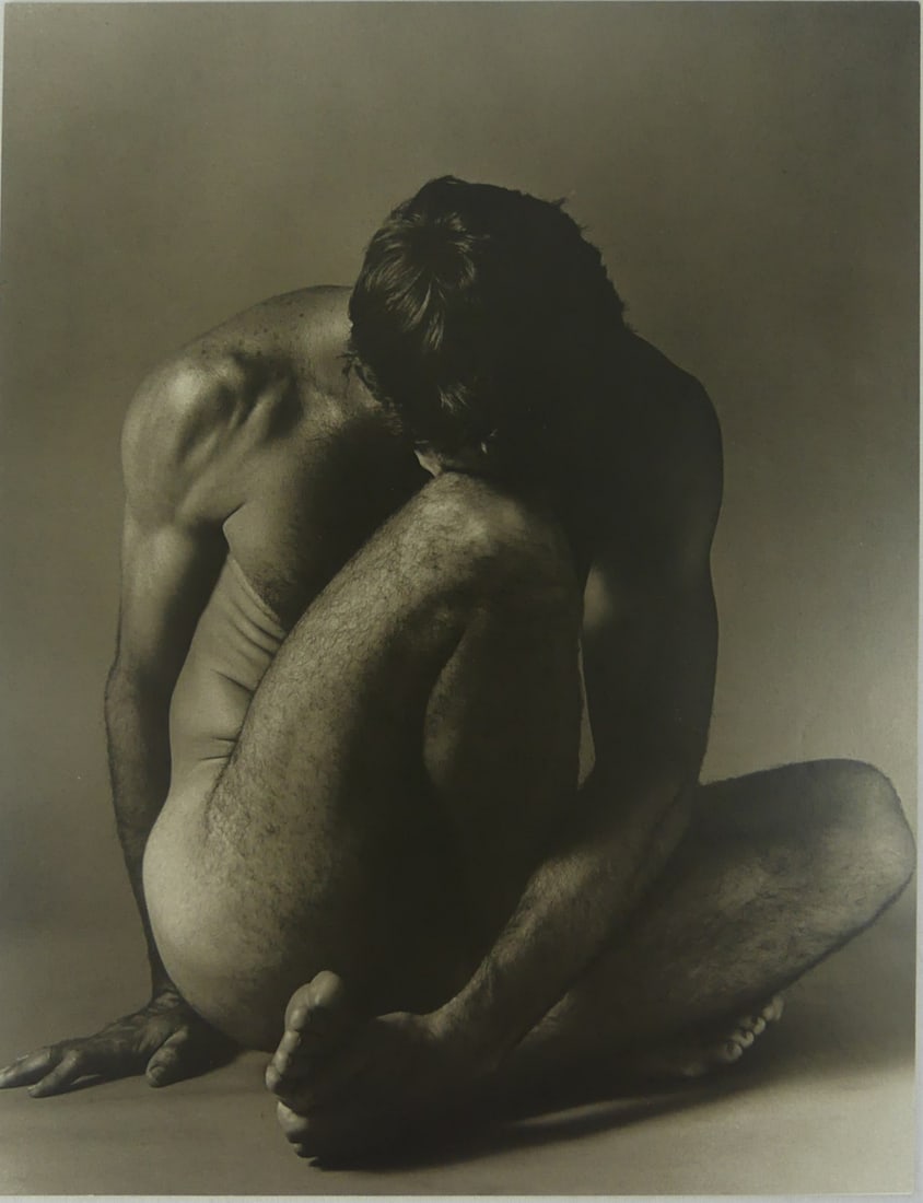 KEN HAAK 'SEATED NUDE MALE' PHOTO-LITHO: Ken Haak photo lithograph depicting the body of a nude male figure. Mounted. Measures 12 3/8" x 9 1/4".