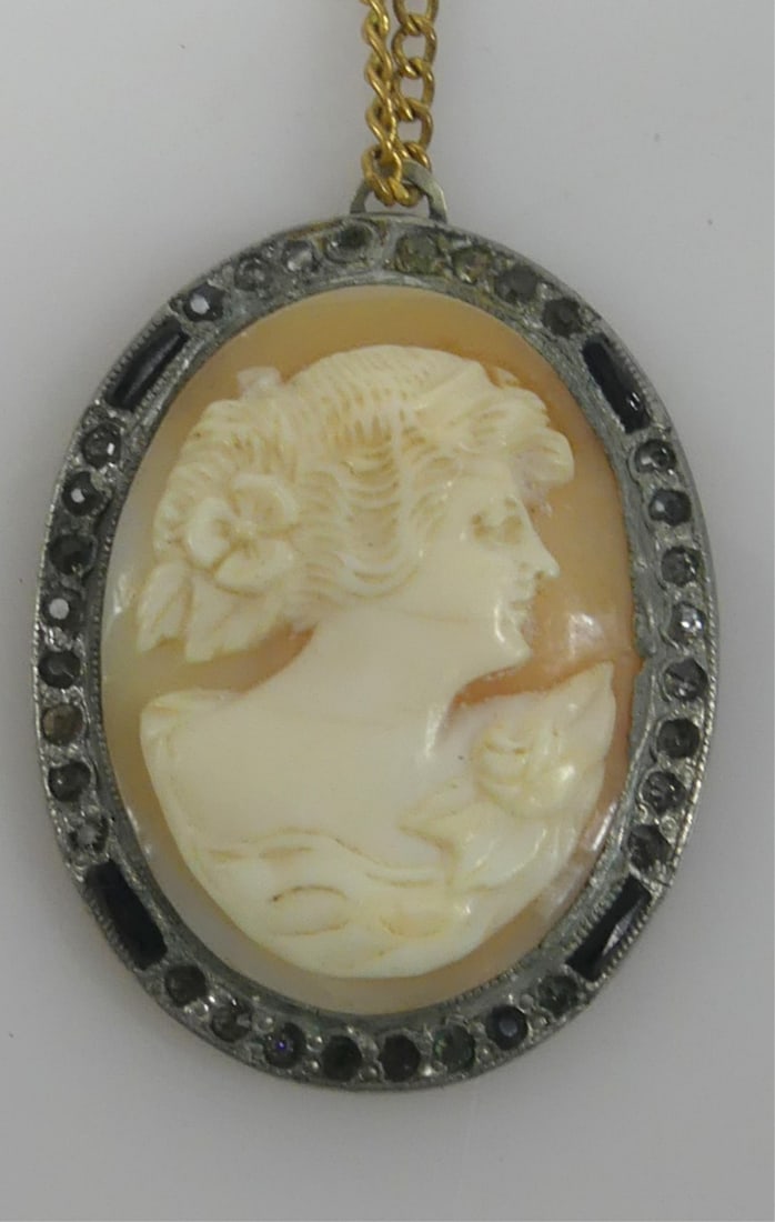 CAMEO PENDANT: Cameo pendant with yellow tone necklace. Pendant measures 30mm x 24mm. Chain measures 15 1/2" length.