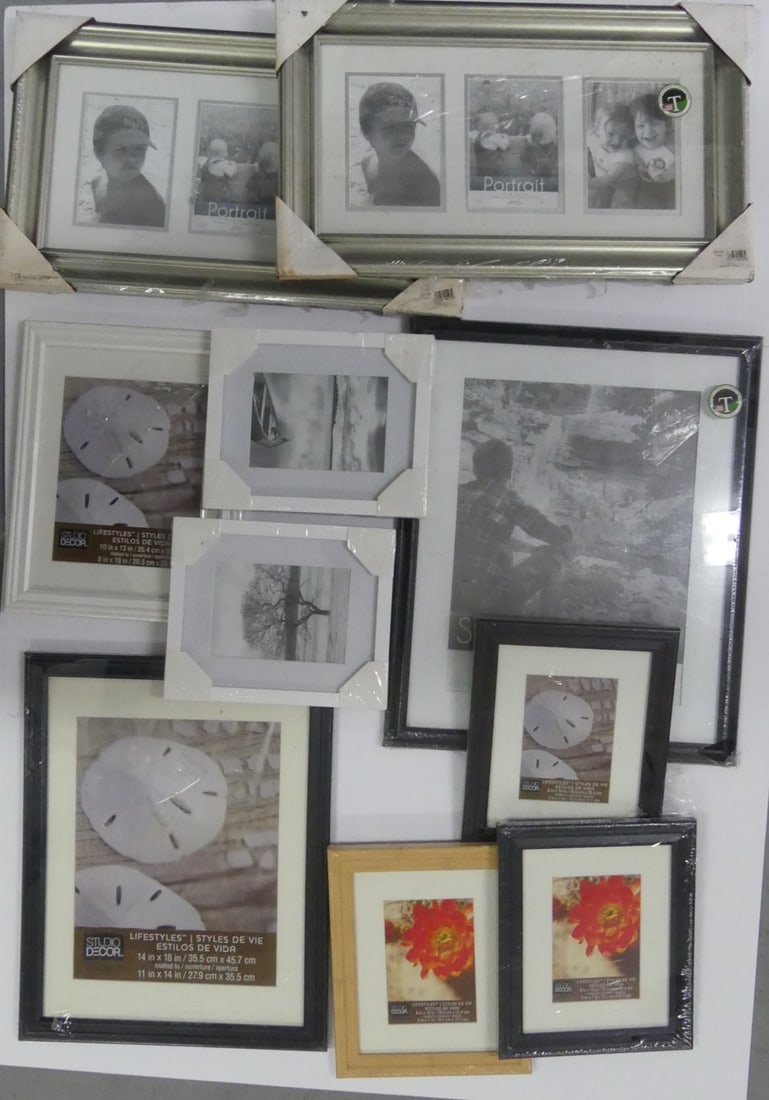 10pc PICTURE FRAMES: Ten picture frames. Various sizes. Largest 22" x 18" and 23 1/2" x 13 3/4".