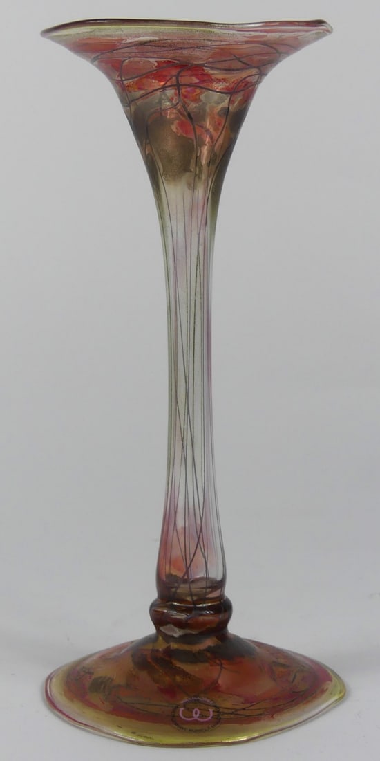 VERA WALTHER ART GLASS VASE: Vera Wather art glass bud vase having narrow body with flared mouth and base. Signed to base. Measures 8" x 3 3/4" x 3 3/4".