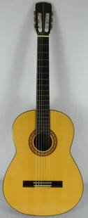 ELVIS PRESLEY OWNED KAY KDG50 GUITAR: Elvis Presley owned Kay KDG Acoustic Guitar. Includes signed letter from Vernon Presley. Case measures 41" x 15 1/2" x 5 1/4".