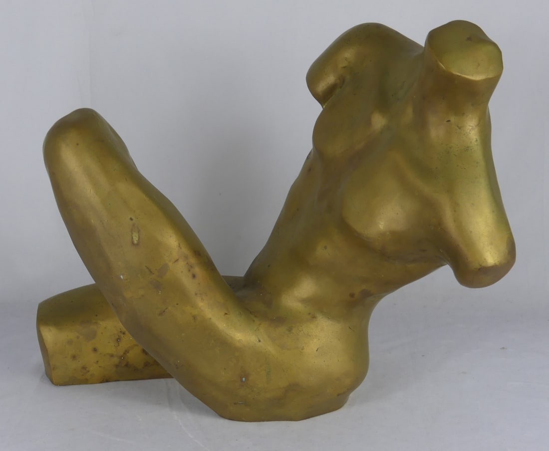 MID-CENTURY BRASS TORSO SCULPTURE: Mid-century brass sculpture of a male torso. Measures 19" x 12" x 15" h.