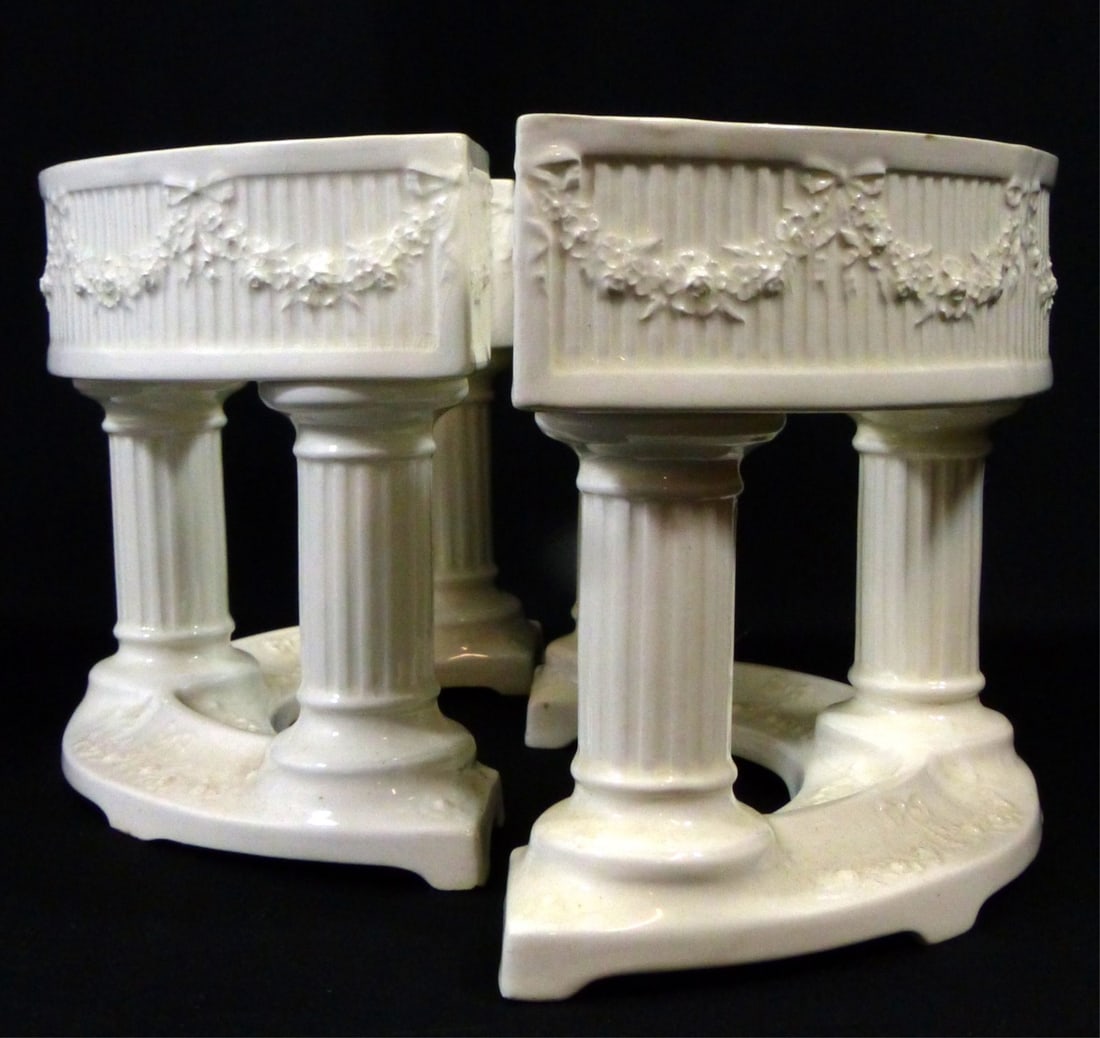 2pc MAX ROESLER GERMAN PORCELAIN CENTERPIECE: Two part Max Roesler German porcelain centerpiece. Each piece having floral garlands and columnar supports. Each impressed and numbered 4691 to underside. Each measures 10" x 5 1/2" x 6 1/2".