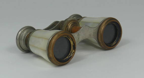CHEVALIER PARIS MOTHER OF PEARL OPERA GLASSES: Chavalier Paris mother of pearl opera glasses. Measures 3 3/4" x 2 1/2" x 1 1/4".