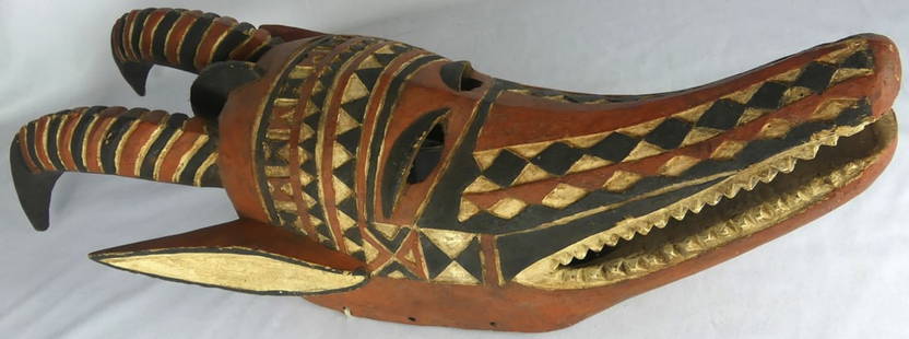 AFRICAN CARVED & PAINTED BOBO TRIBAL MASK: African carved and painted Bobo ceremonial tribal mask. Measures 32" x 10 1/2" x 8".