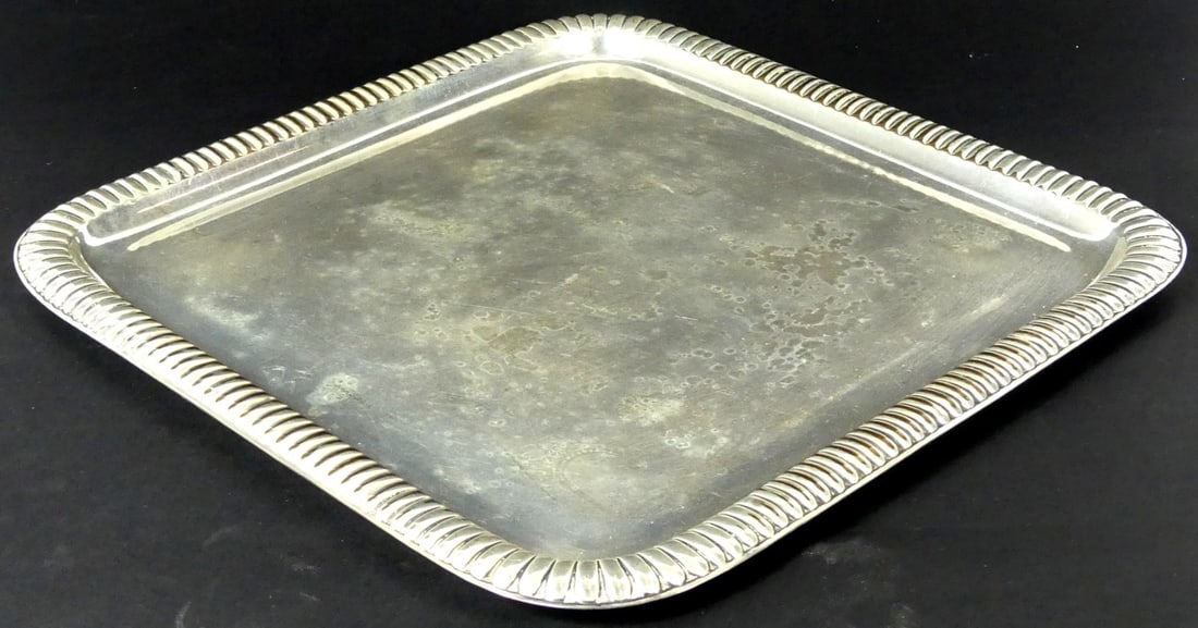 TIFFANY & CO MAKERS SILVER SOLDERED SQUARE TRAY: Tiffany & Company Makers silver soldered square tray with ribbed rim. Marked to underside. Measures 12 1/4" x 12 1/4" x 1/2"