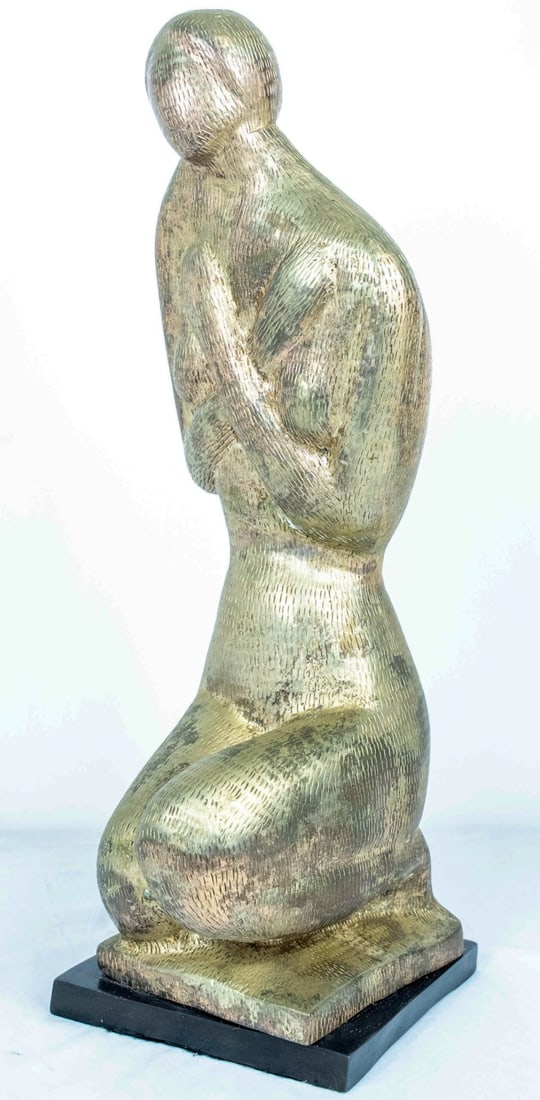 KNEELING WOMAN METAL SCULPTURE SIGNED MAO: Metal sculpture depicting a woman kneeling with arms crossed. Signed Mao, numbered 10/50 and dated 1998. Measures 22 1/4" x 8 3/4" x 7 1/4".