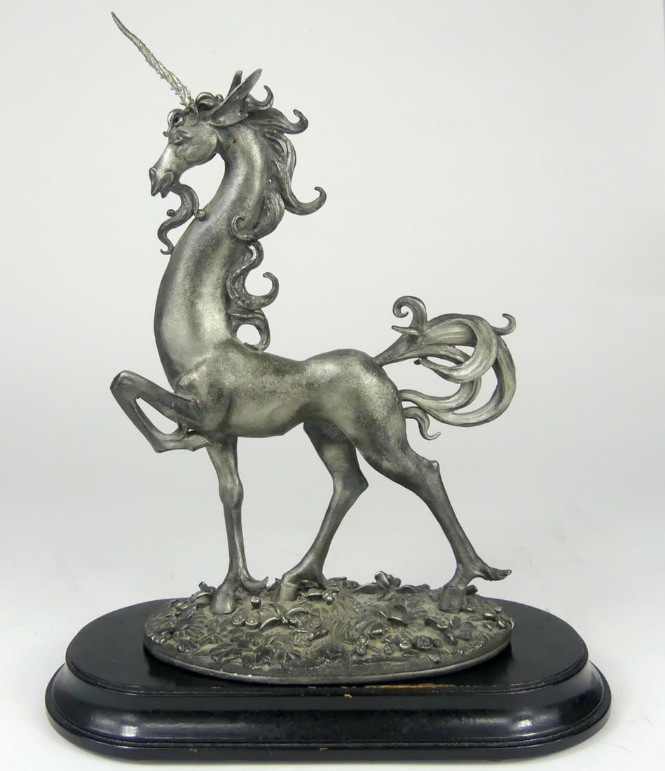 PERTH PEWTER UNICORN JAMES LANE CASEY: Perth Pewter Unicorn designed by James Casey Lane. Marked to underside. Figure measures 9" x 5 1/2" x 3 1/4". Wood base measures 8" x 4". Note: detachable tail.
