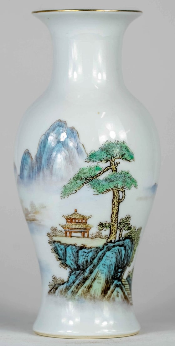 CHINESE REPUBLIC PERIOD PORCELAIN VASE: Chinese Republic Period porcelain vase depicting a mountainous landscape with pagoda and boats. Marked to underside. Measures 8 1/8" x 3 1/2" x 3 1/2".