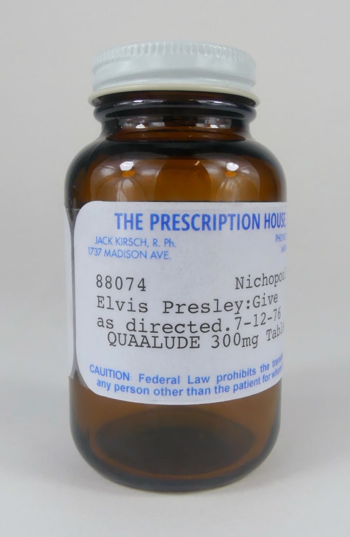 PRESCRIPTION HOUSE ELVIS PRESLEY QUAALUDE BOTTLE: The Prescription House, Inc prescription bottle. Quaalude 300mg prescribed to Elvis Presley by Dr Nichopoulos. Dated 1976. Bottle measures 3 3/4" x 2" x 2".