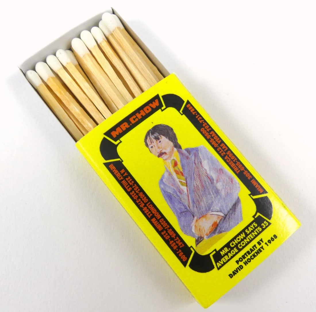 ED RUSCHA & DAVID HOCKNEY MR. CHOW MATCHBOX: Ed Ruscha and David Hockney Mr. Chow matchbox with matches. Measures 2" x 1 3/8" x 1/2".