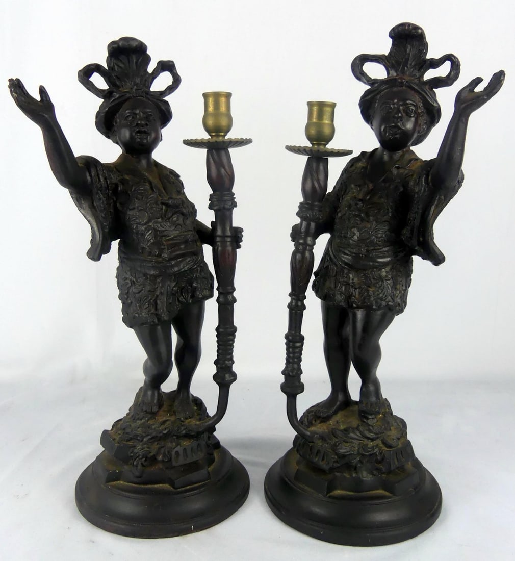 PR VINTAGE ITALIAN BLACKAMOOR FIGURAL CANDLESTICKS: Pair of Italian resin figural Blackamoor candle holders. Each measures 16 1/2" x 8" x 6".