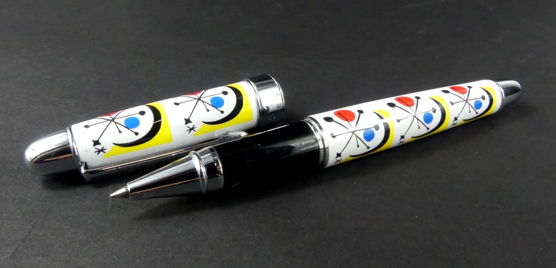 ACME STUDIO ALEXANDER CALDER ROLLERBALL PEN: Acme Studio Alexander Calder rollerball pen for the Metropolitan Museum of Art. Measures 5 3/8" length.